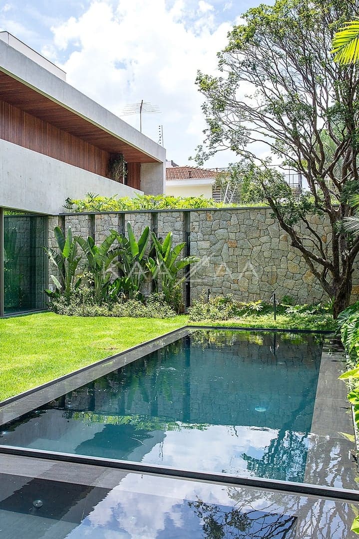 Contemporânea e toda mobiliada: casa com ambientes livres e jardim magnífico em rua fechada em Alto de Pinheiros. - Foto 19