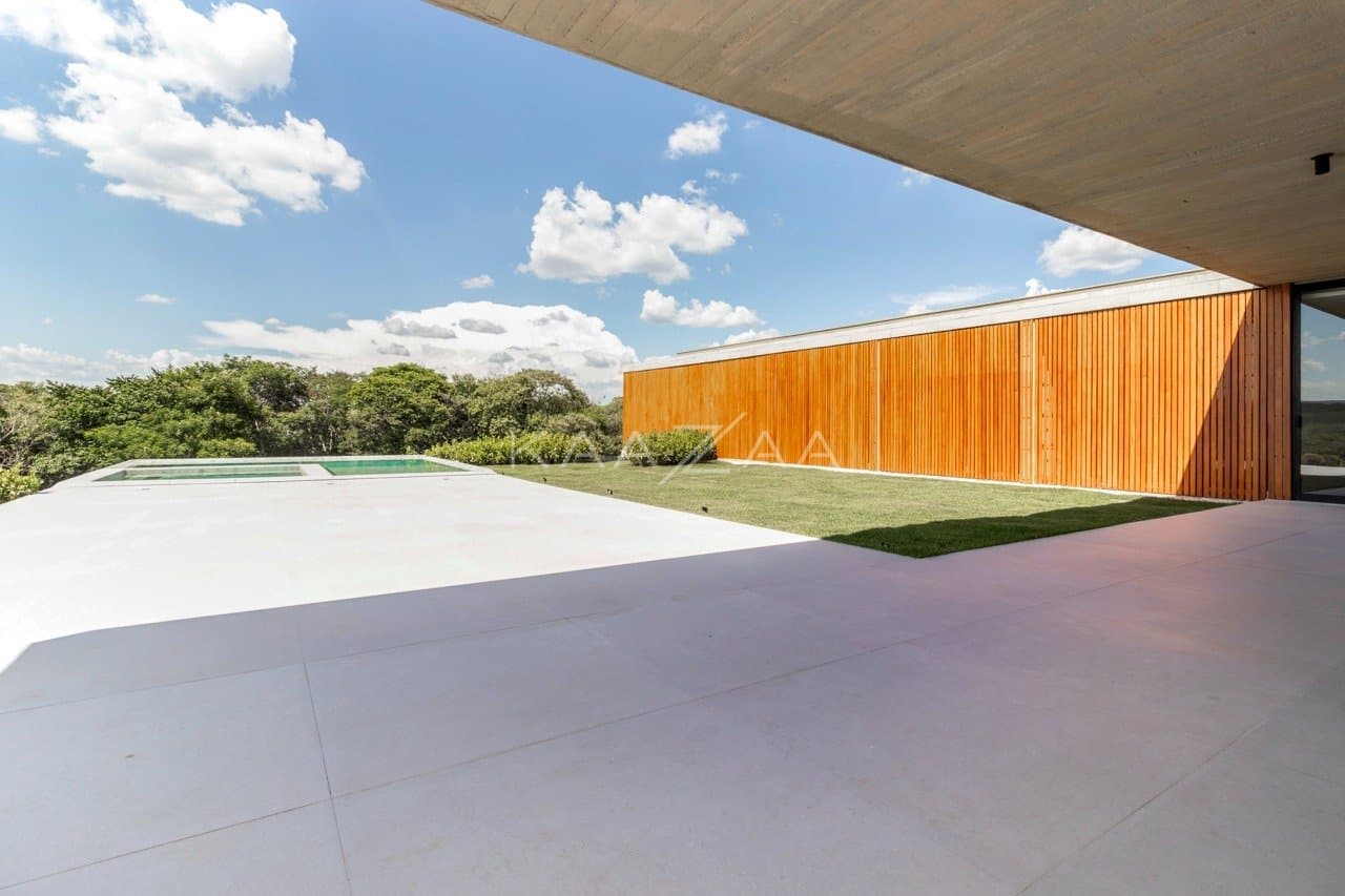 Casa em elegante diálogo com a natureza na Baroneza - Foto 4