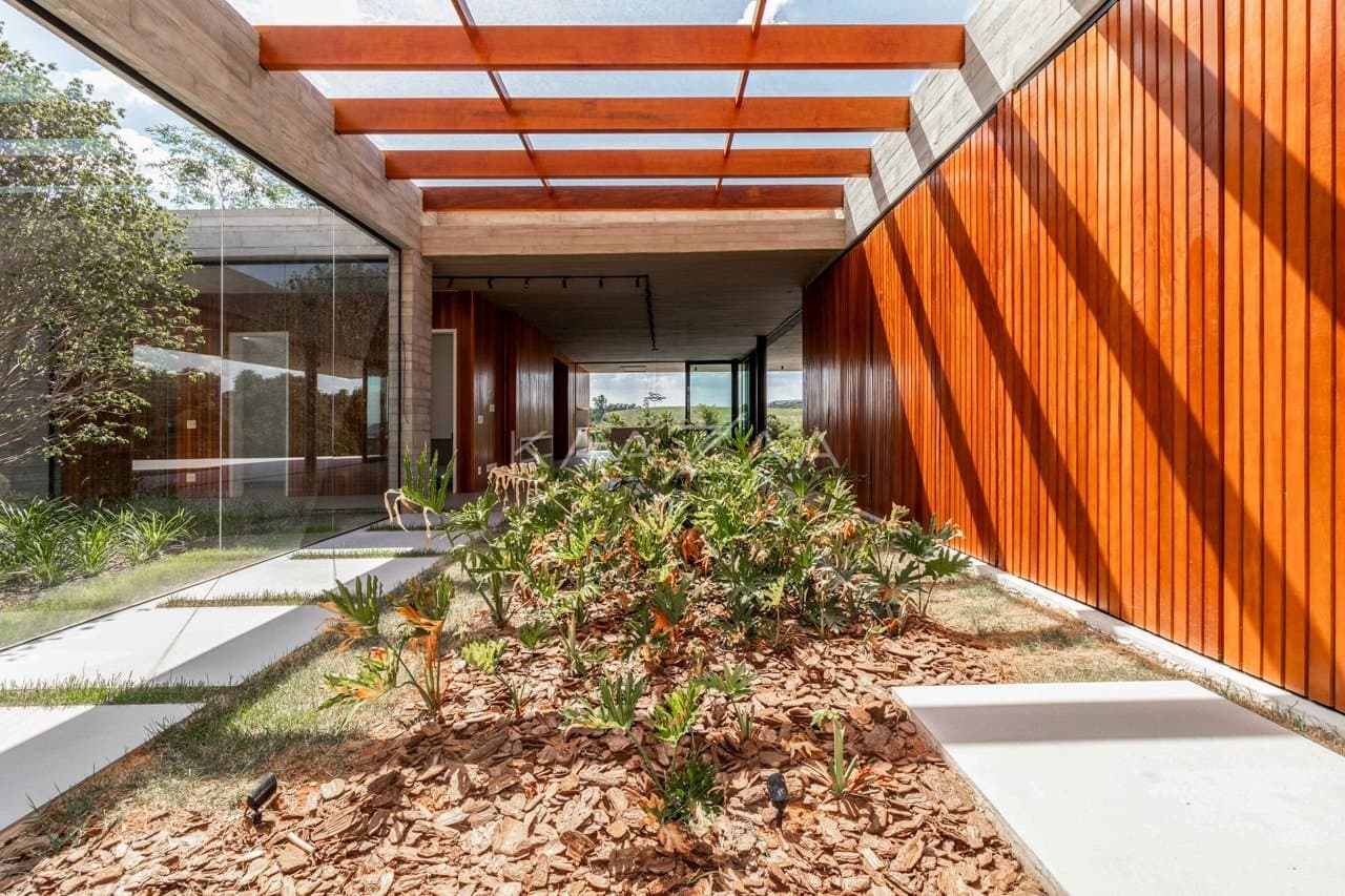 Casa em elegante diálogo com a natureza na Baroneza - Foto 40