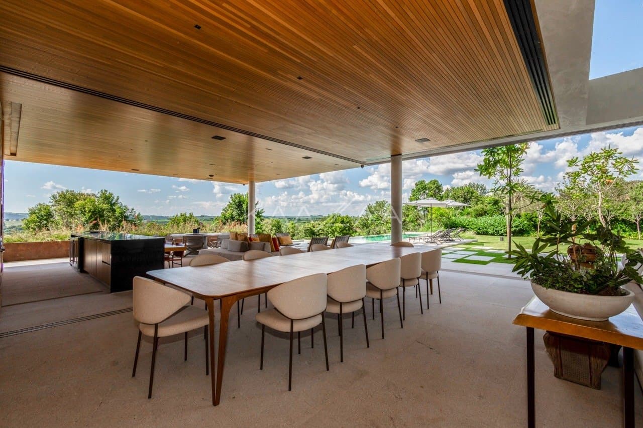 Casa contemporânea feita para interagir com a natureza ao redor. Projeto na Quinta da Baroneza. - Foto 29
