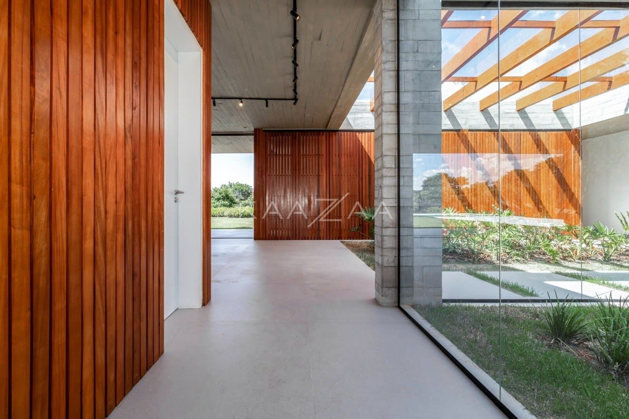 Casa em elegante diálogo com a natureza na Baroneza - Foto 18