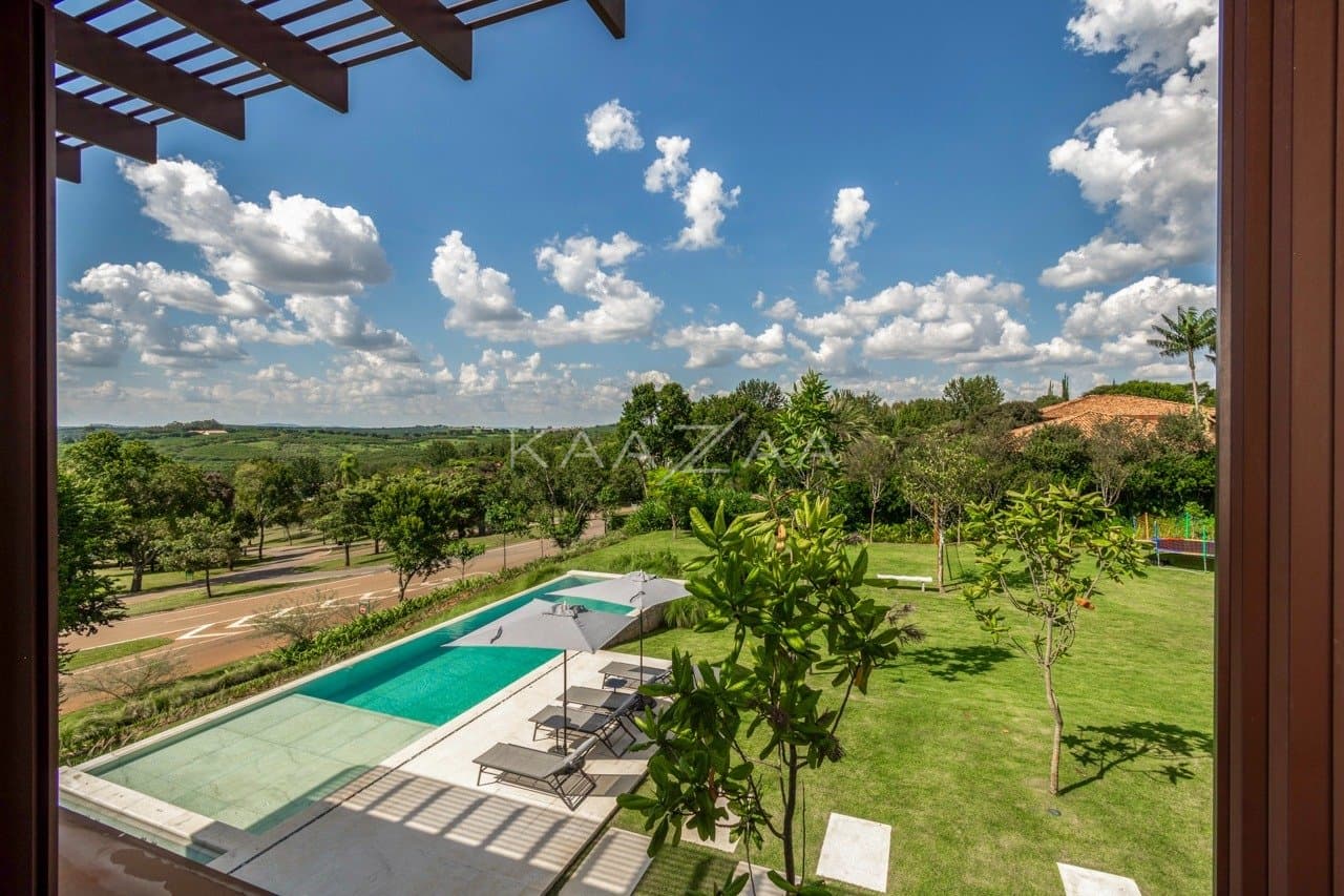 Casa contemporânea feita para interagir com a natureza ao redor. Projeto na Quinta da Baroneza. - Foto 43
