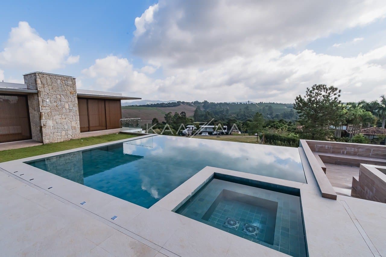 Um projeto de casa de campo feito para limpar a vista e se inspirar. No condomínio Quinta da Baroneza. - Foto 8