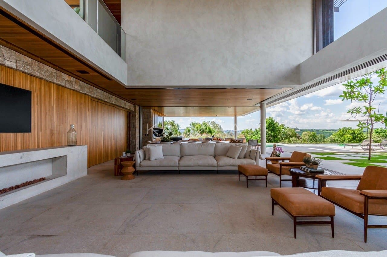Casa contemporânea feita para interagir com a natureza ao redor. Projeto na Quinta da Baroneza. - Foto 23
